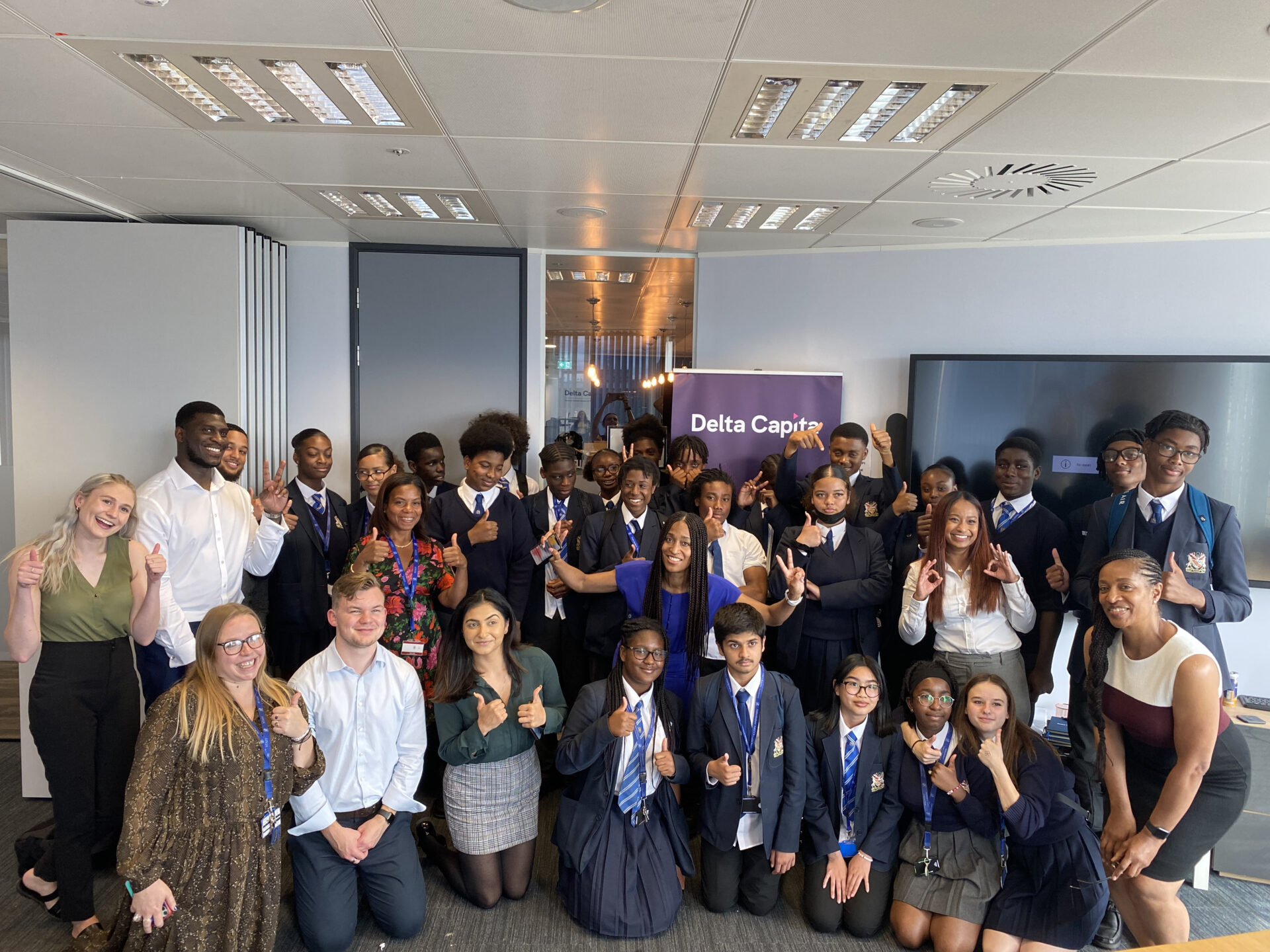 Delta Capita insight day, all the students and role models gathered together for a smiley photo