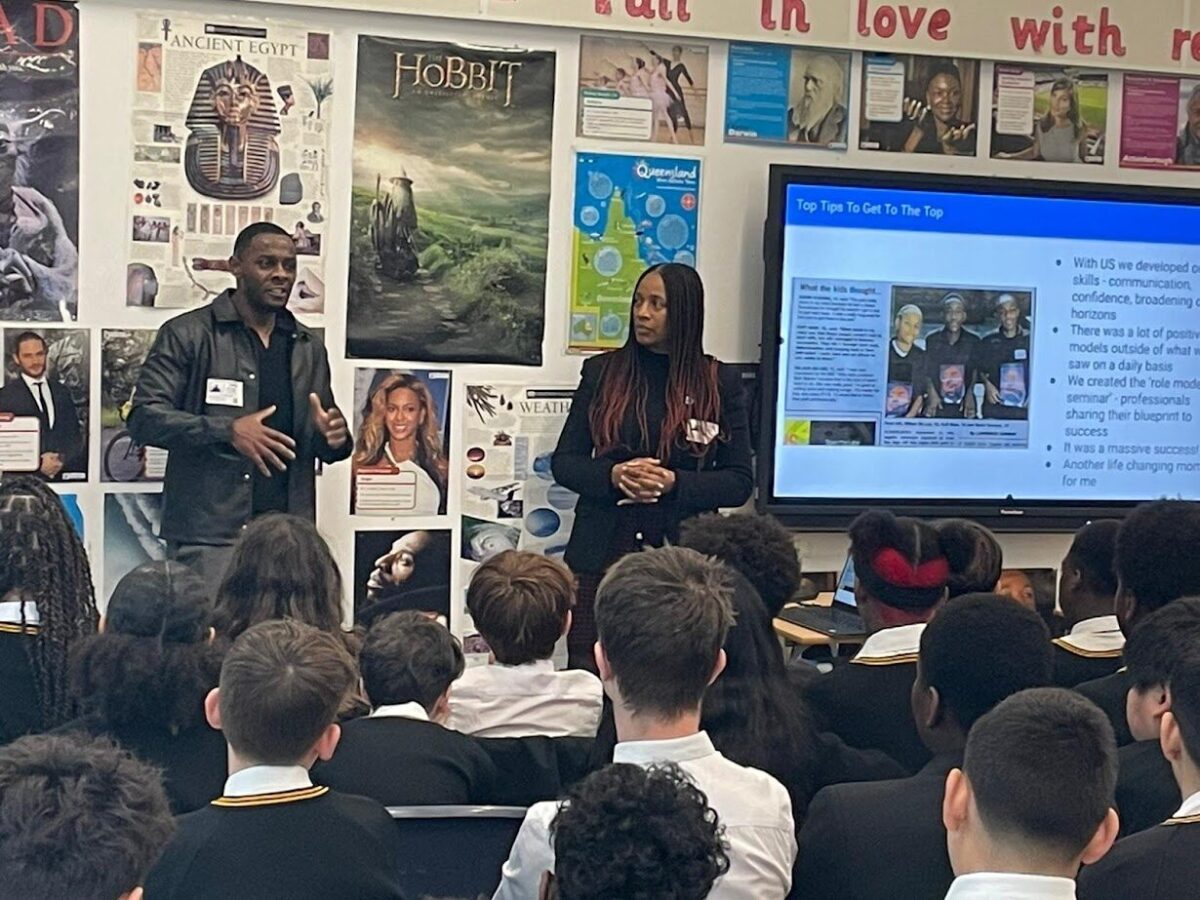 Gavin Kamara, Senior Website Manager delivering a career talk at local school