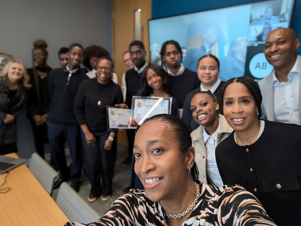 Participants of the DreamBig@WTW scheme pose for a picture with executives of the company and the CEO of Urban Synergy