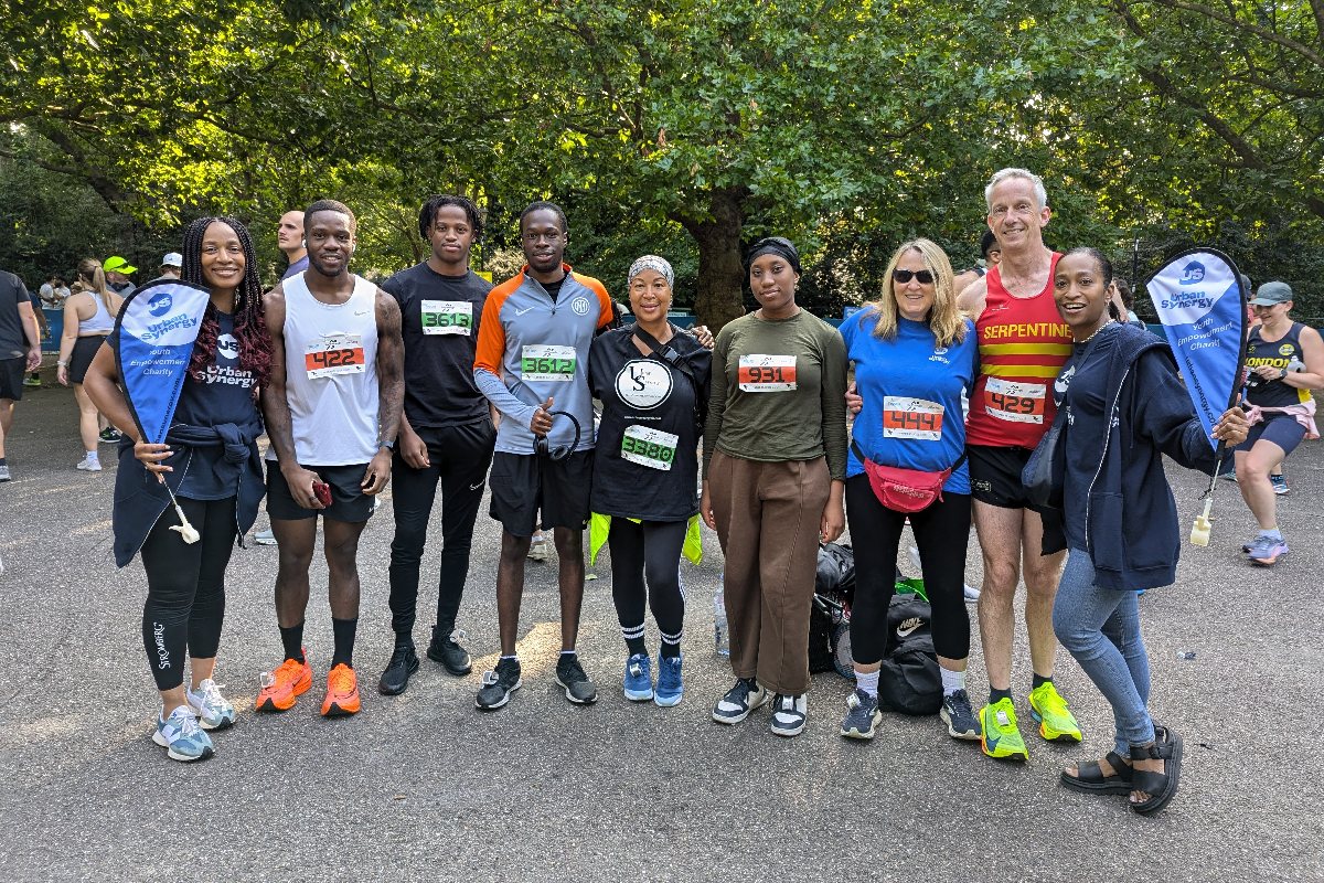 A group of Urban Synergy fundraisers pose for a photo at a recent fun run.