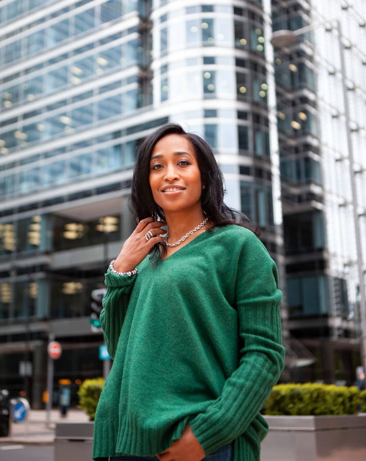 Urban Synergy CEO Leila Thomas standing on street in Canary Wharf